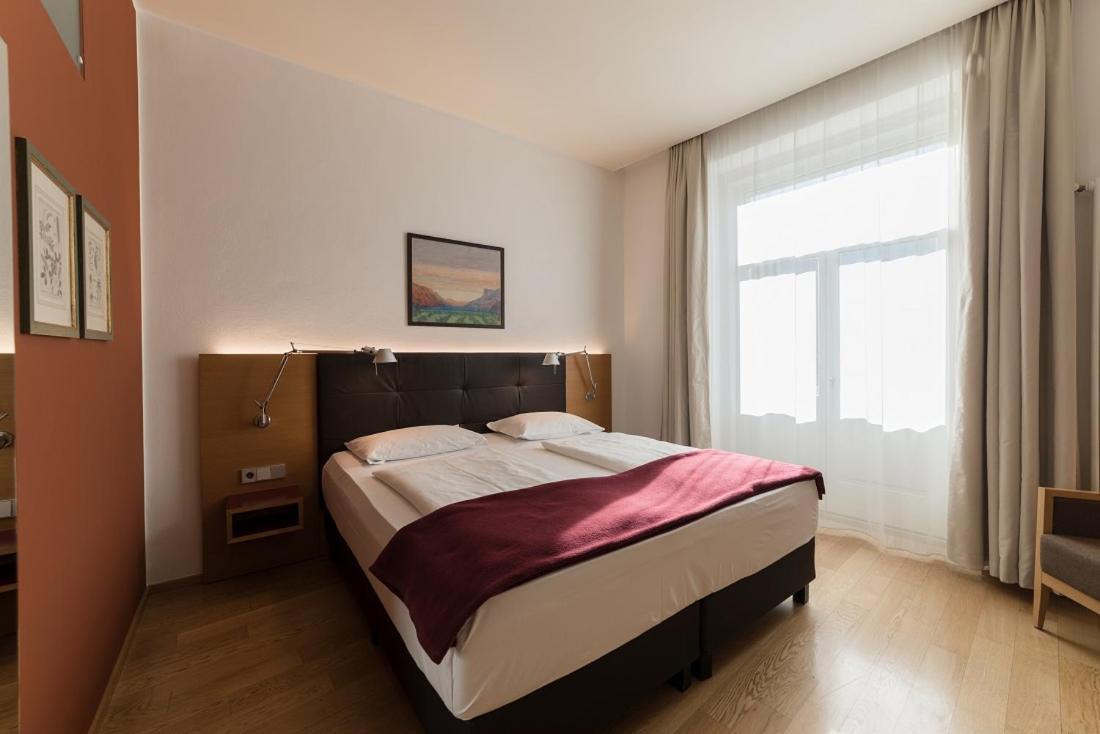 Hotel Stiegl Scala Болзано Стая снимка