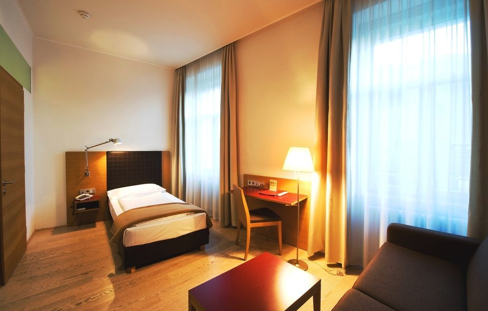 Hotel Stiegl Scala Болзано Стая снимка